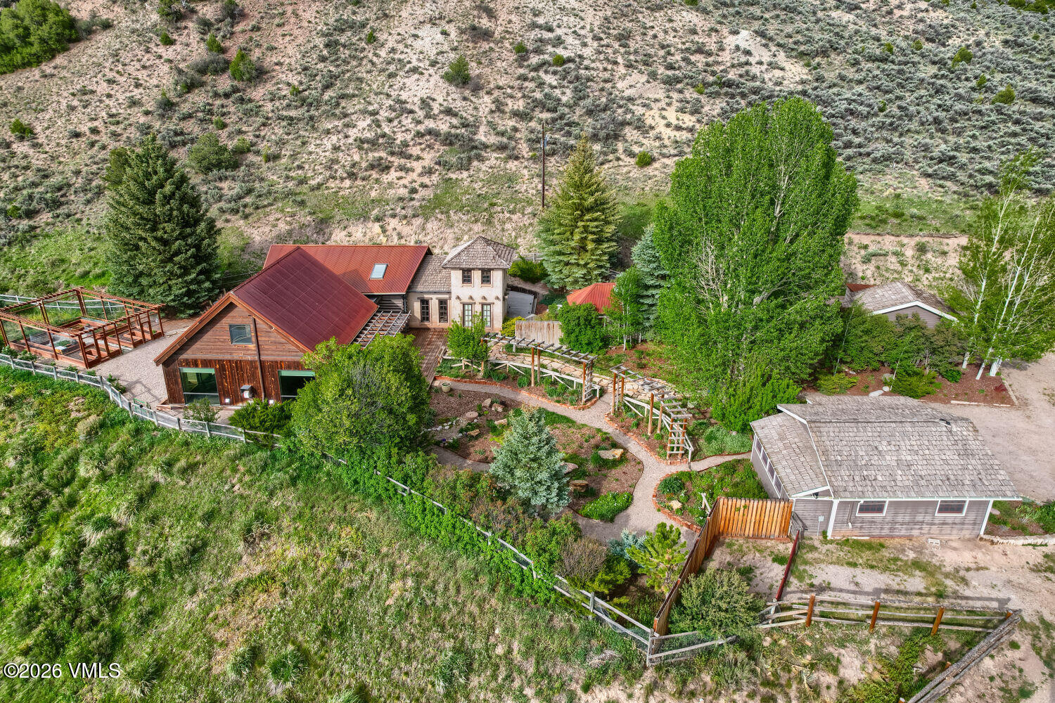 1644 Squaw Creek Road Edwards, CO 81632 - Photo 2 of 21 an aerial view of a house with yard swimming pool and outdoor seating