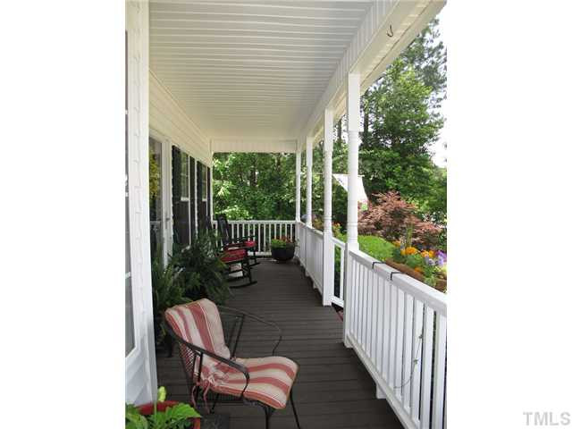 427 Saddle Ridge Drive Willow Spring, NC 27592 - Photo 3 of 19 a view of a porch with furniture