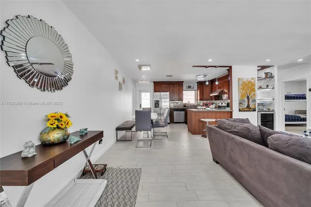 a living room with furniture and a table