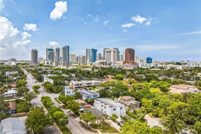 a view of a city with tall buildings