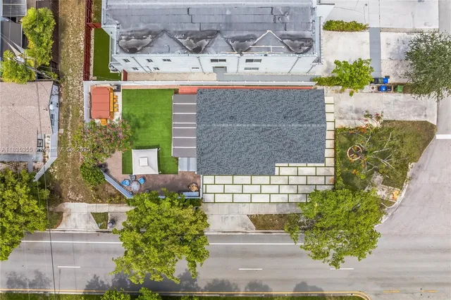 a aerial view of a house with a garden