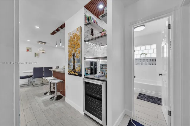 a view of kitchen with livingroom and furniture