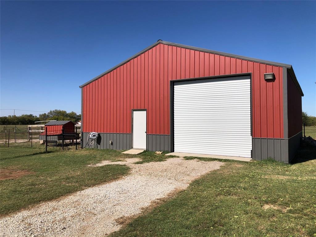 6025 Ge Horton Road Justin, TX 76247 - Photo 36 of 40 View of outdoor structure with driveway