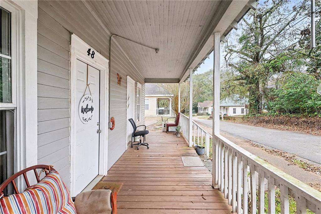 48 Maple Street Grantville, GA 30220 - Photo 21 of 26 a view of a balcony with wooden floor