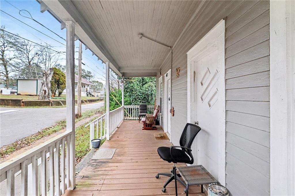 48 Maple Street Grantville, GA 30220 - Photo 22 of 26 a view of a balcony with chairs