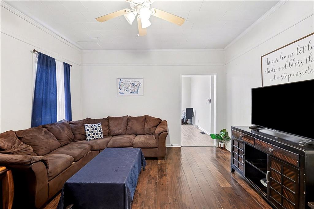 48 Maple Street Grantville, GA 30220 - Photo 6 of 26 a living room with furniture and a flat screen tv