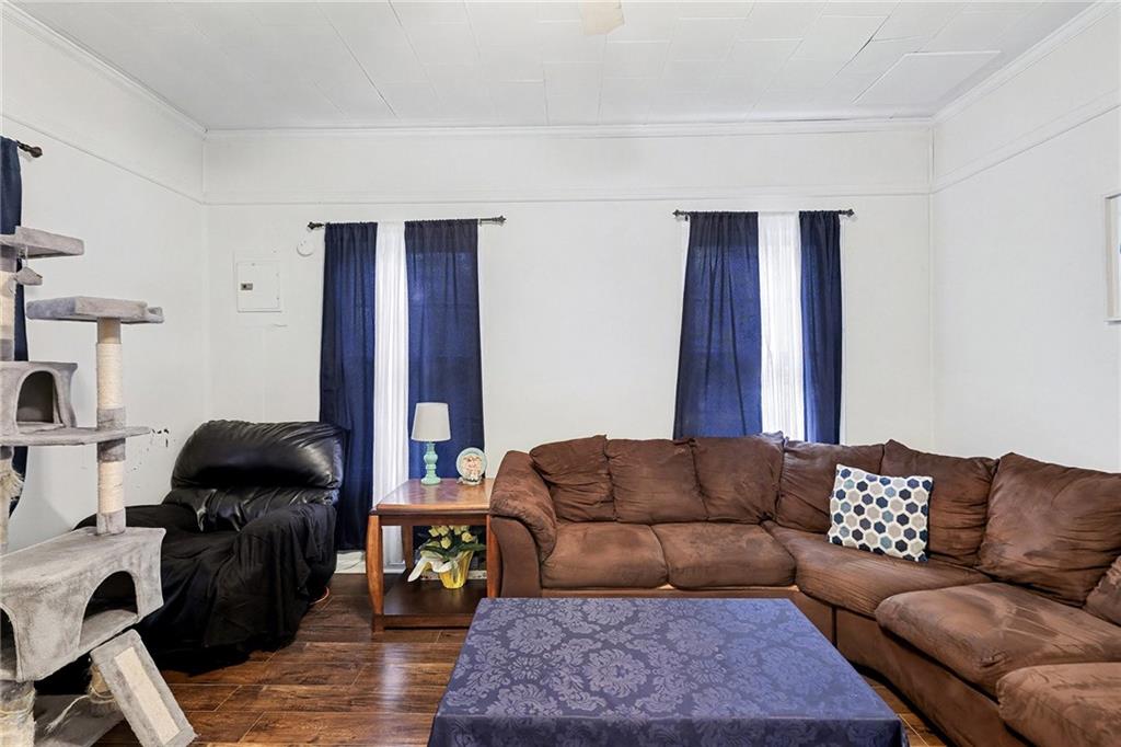 48 Maple Street Grantville, GA 30220 - Photo 7 of 26 a living room with furniture and a couch
