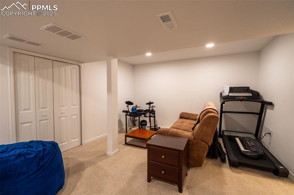 15619 Kitchener Way Monument, CO 80132 - Photo 27 of 40 a living room with furniture