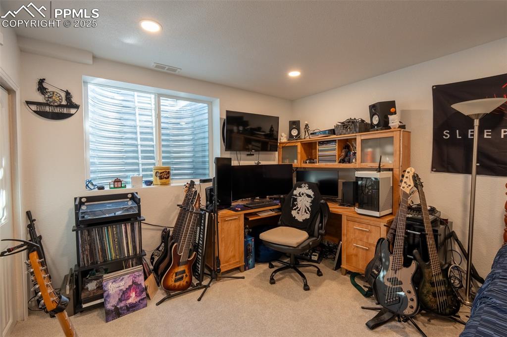 15619 Kitchener Way Monument, CO 80132 - Photo 31 of 40 a view of a workspace with furniture and a window