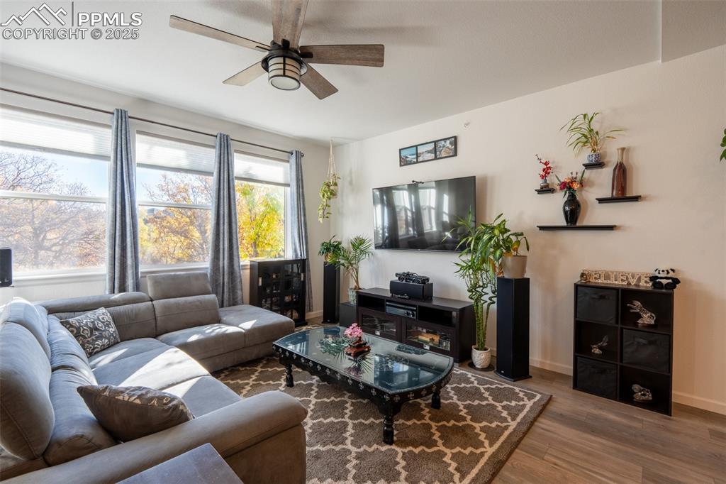 15619 Kitchener Way Monument, CO 80132 - Photo 4 of 40 a living room with furniture fireplace and flat screen tv