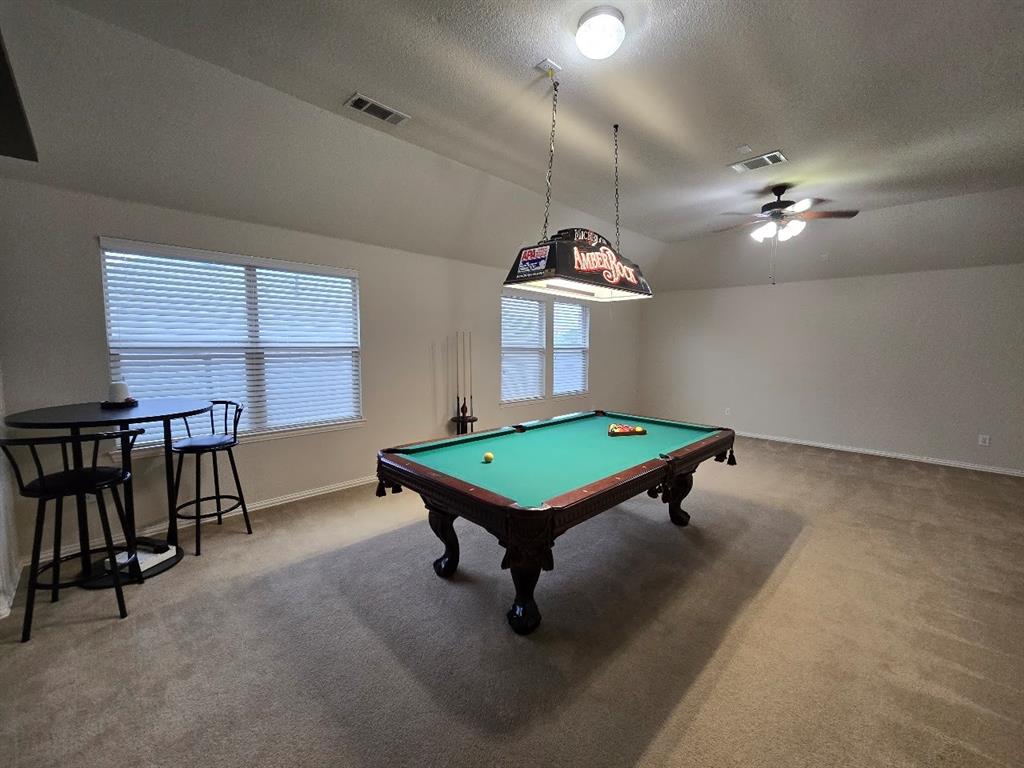 213 Willet Court Little Elm, TX 75068 - Photo 22 of 28 Recreation room with pool table, light colored carpet, and a ceiling fan