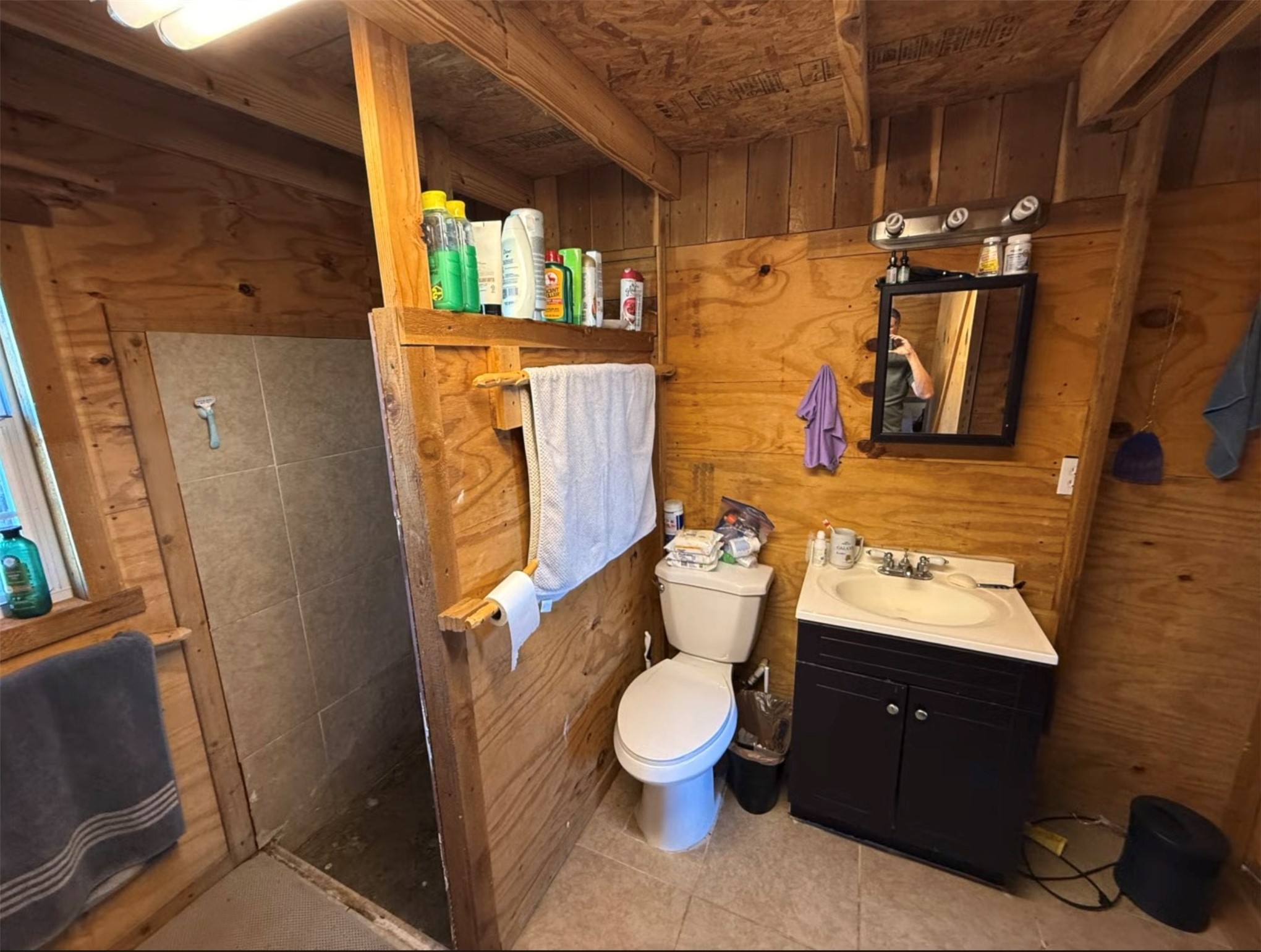 12391 SD 52000 Rocksprings, TX 78880 - Photo 45 of 48 a bathroom with a toilet sink and mirror