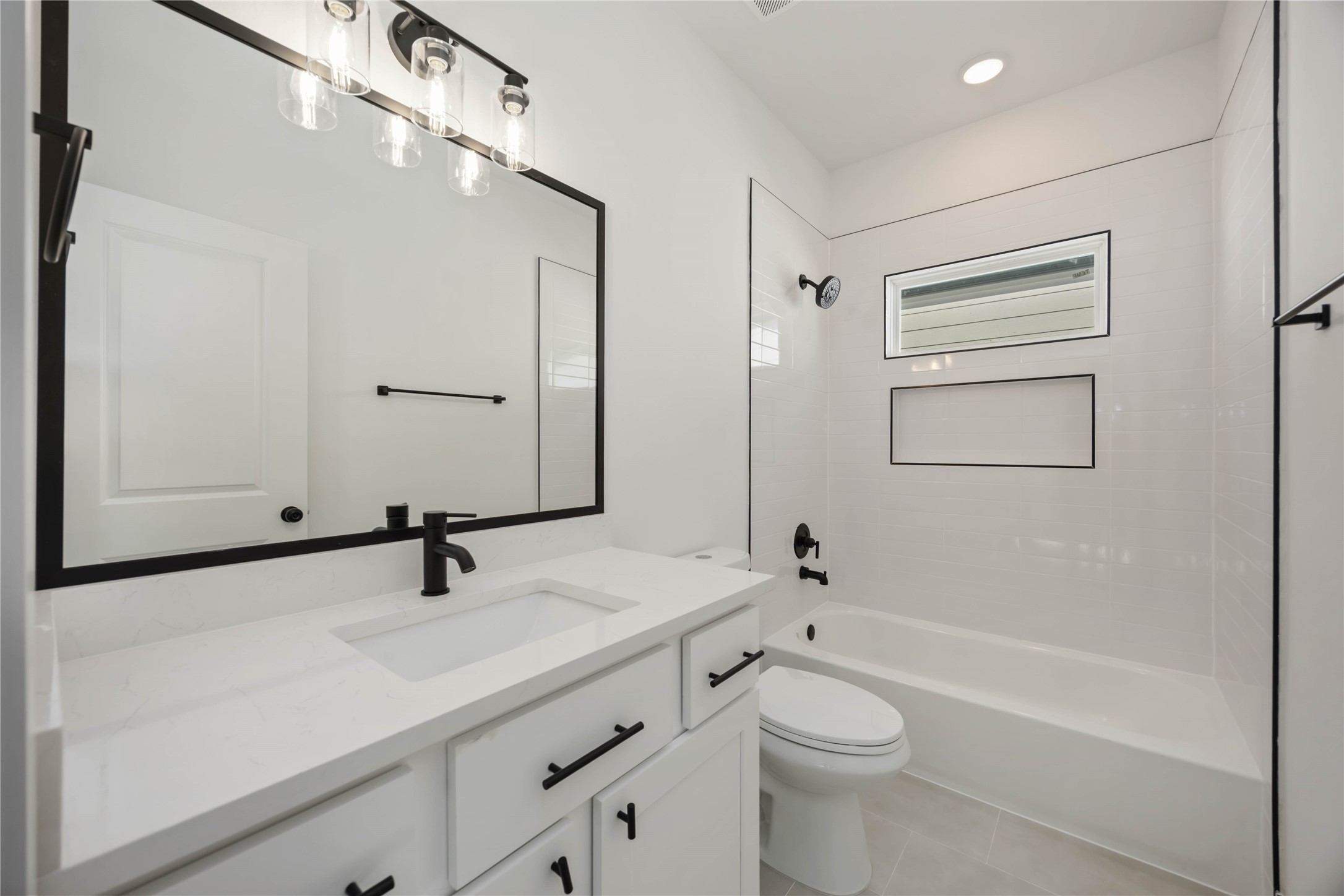 1466 Ferguson Way, Unit B Houston, TX 77088 - Photo 24 of 28 a bathroom with a sink a toilet and shower