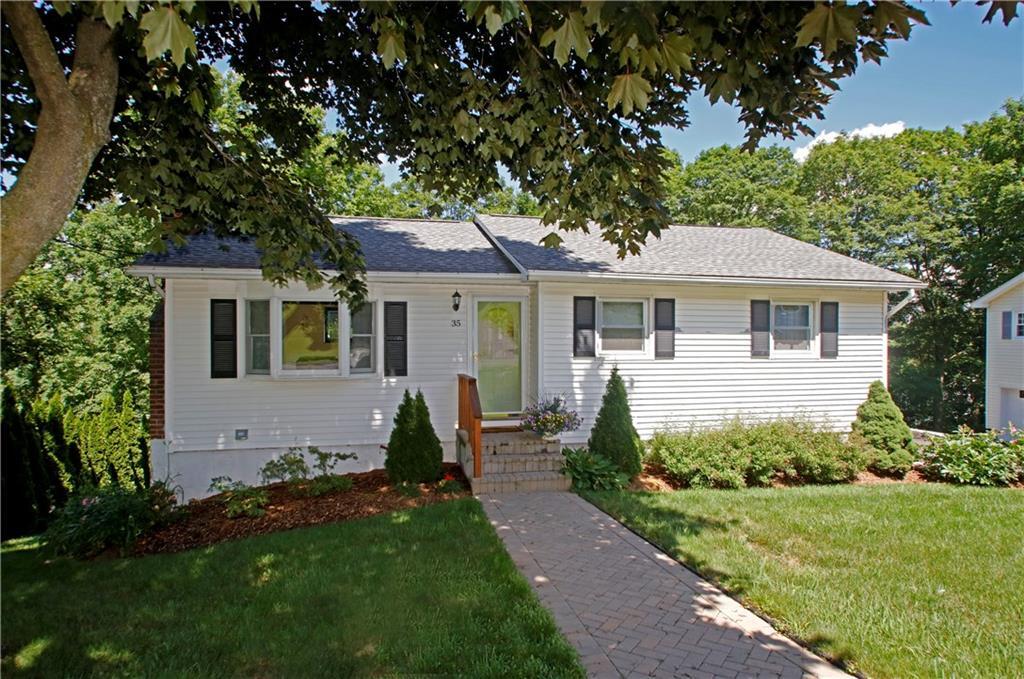 35 Hillandale Road Danbury, CT 06811 - Photo 1 of 1 a front view of a house with a garden