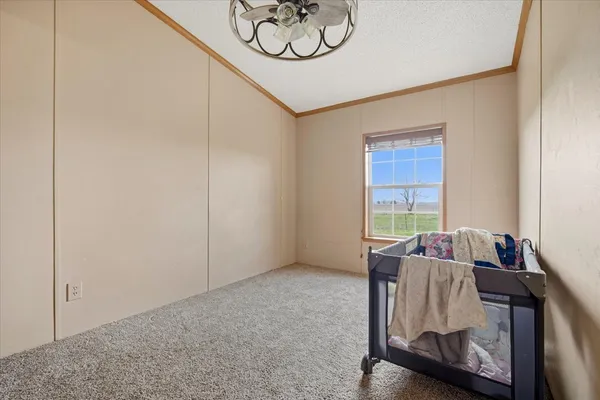 a view of workspace with furniture and window