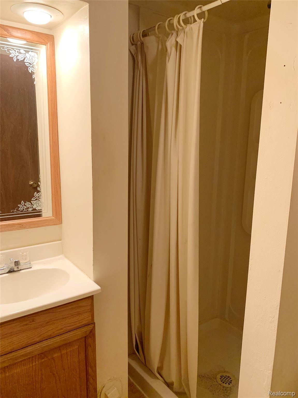 2525 Texter Road Leonard, MI 48367 - Photo 15 of 26 Basement Bathroom With Shower