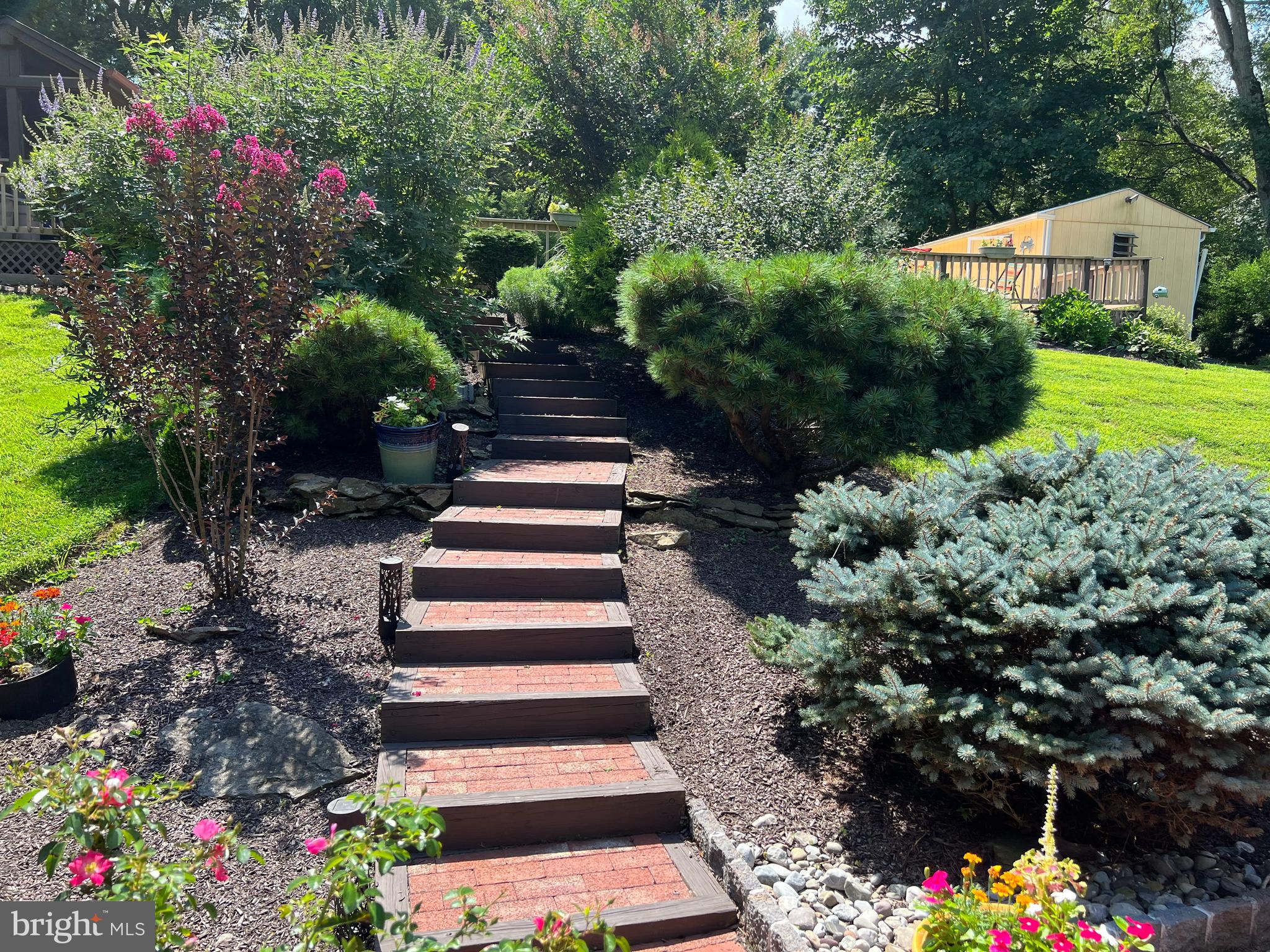 246 Chesterville Road Landenberg, PA 19350 - Photo 12 of 62 a view of a garden with flowers and flowers
