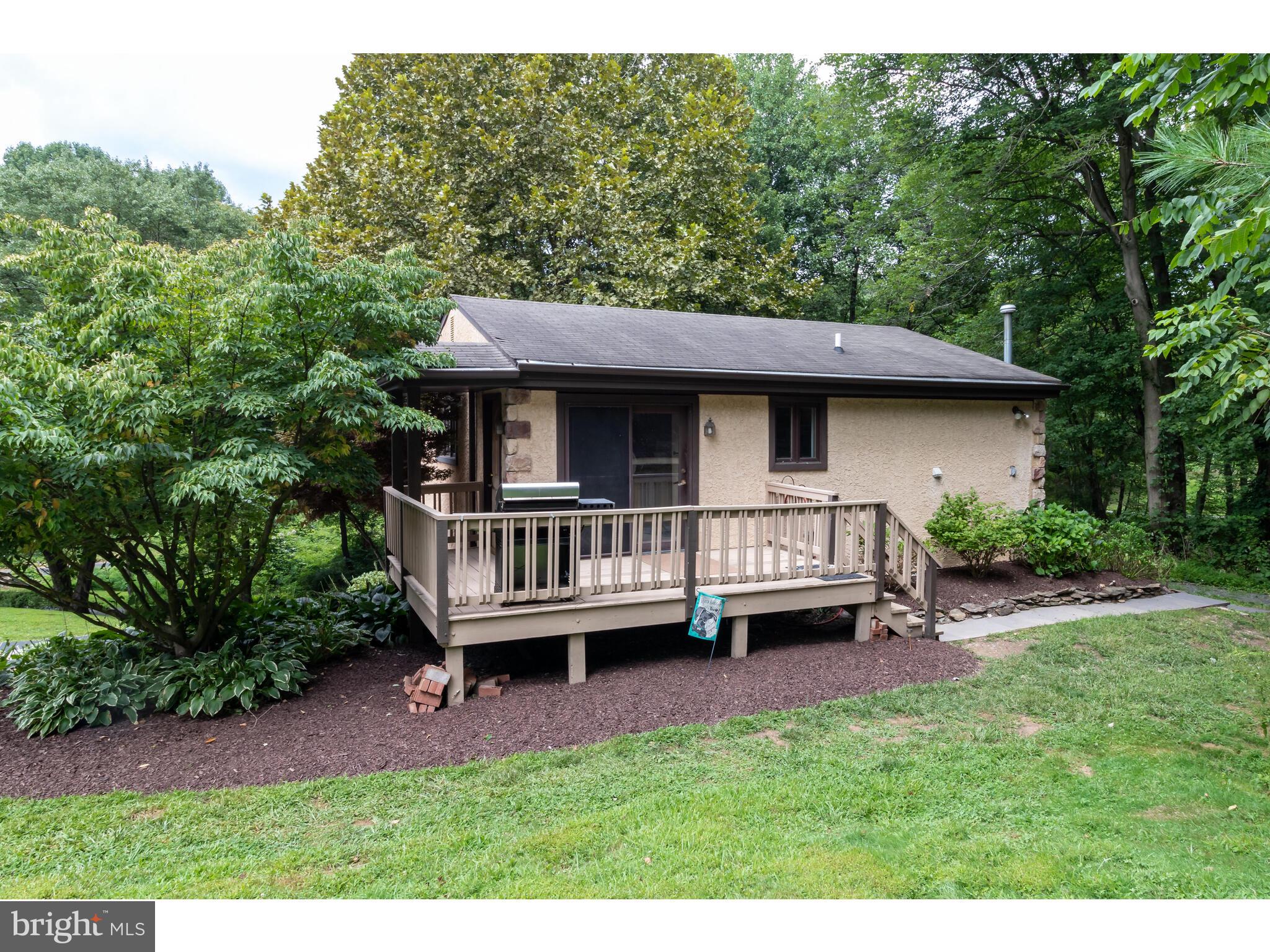 246 Chesterville Road Landenberg, PA 19350 - Photo 24 of 62 a view of a house with backyard and deck