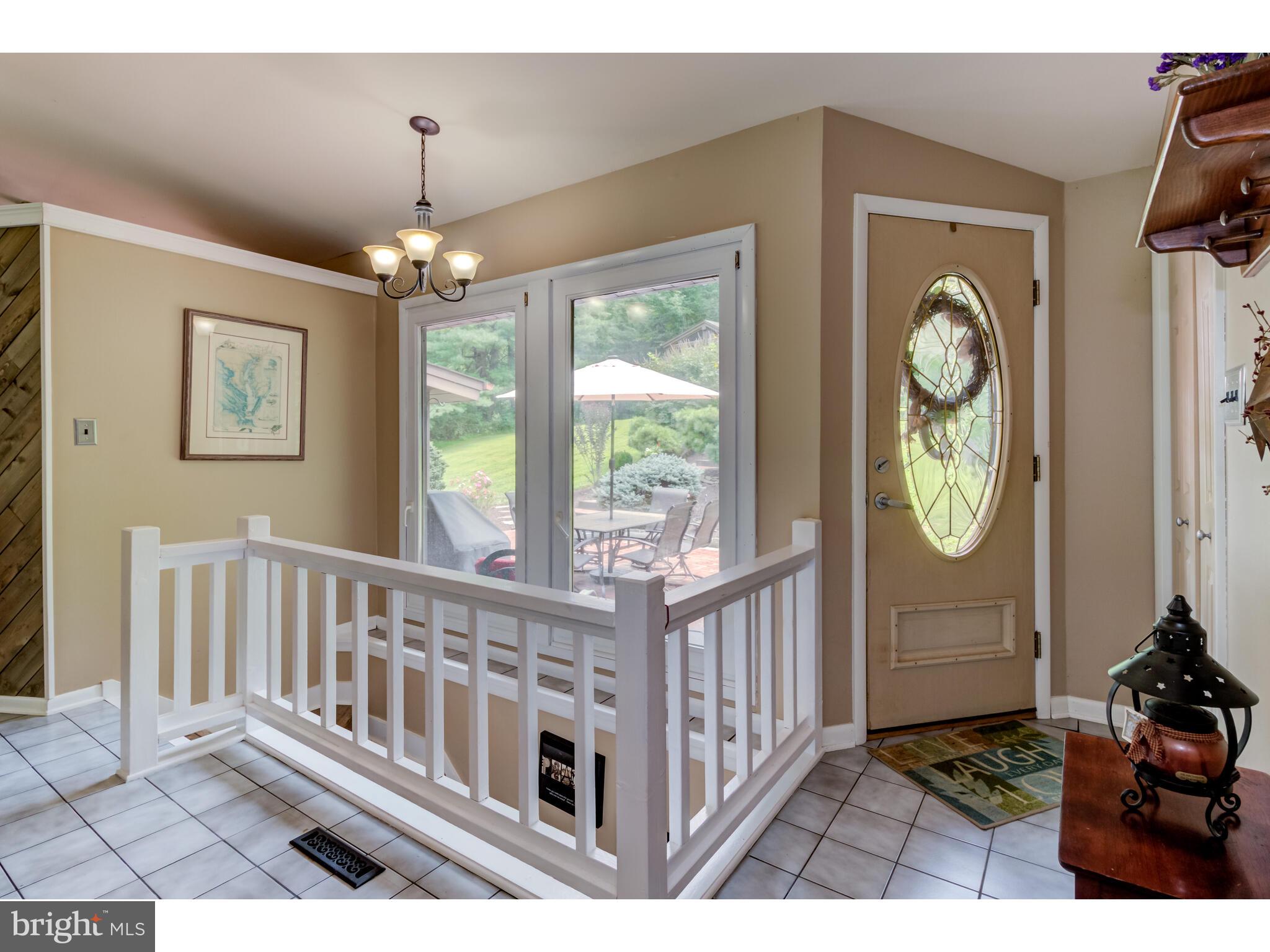 246 Chesterville Road Landenberg, PA 19350 - Photo 25 of 62 a view of entryway with wooden floor