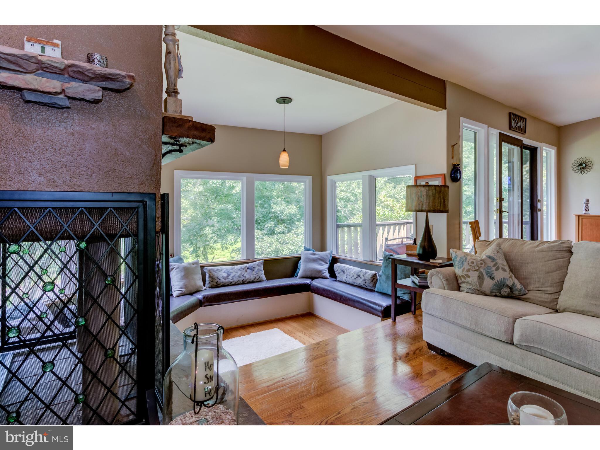246 Chesterville Road Landenberg, PA 19350 - Photo 29 of 62 a living room with furniture and a large window
