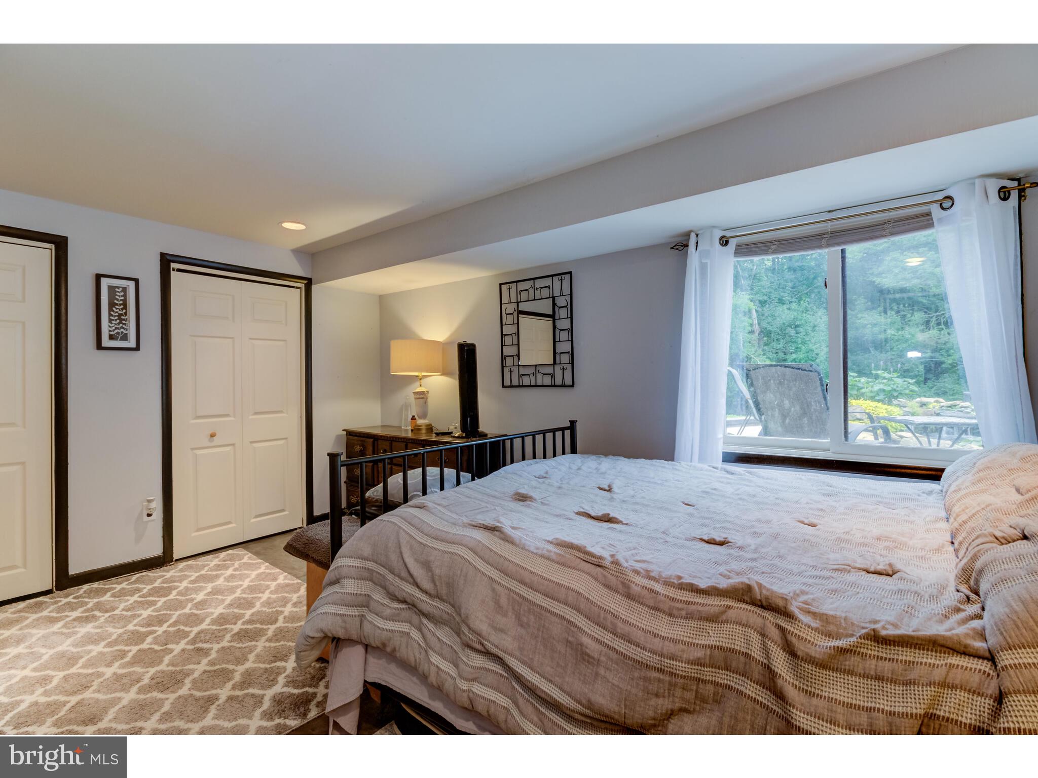 246 Chesterville Road Landenberg, PA 19350 - Photo 53 of 62 a bedroom with a bed and a large window