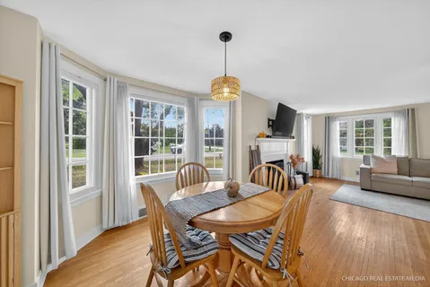 a bedroom with furniture and a chandelier