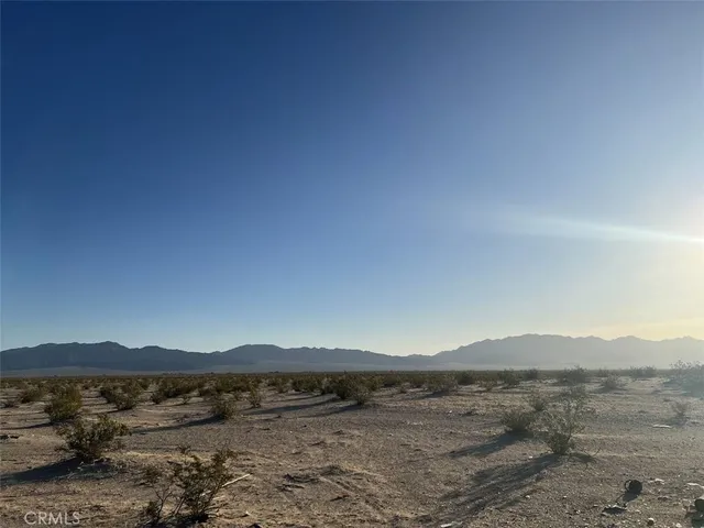 a view of mountain with lake view