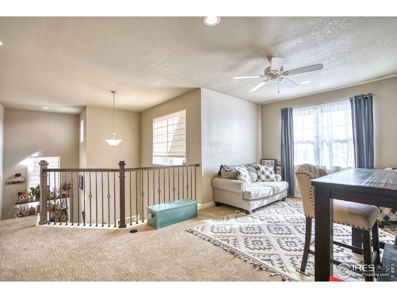 810 Ranchhand Drive Berthoud, CO 80513 - Photo 16 of 40 Versatile loft for family room, gaming or reading space.