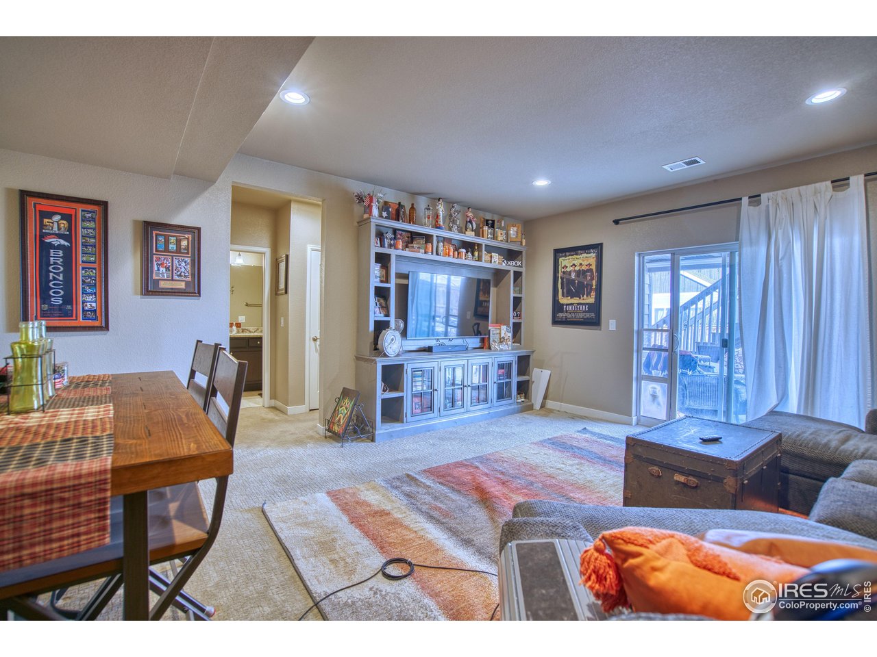 810 Ranchhand Drive Berthoud, CO 80513 - Photo 27 of 40 Walk-out basement provides access to concrete patio & backyard.