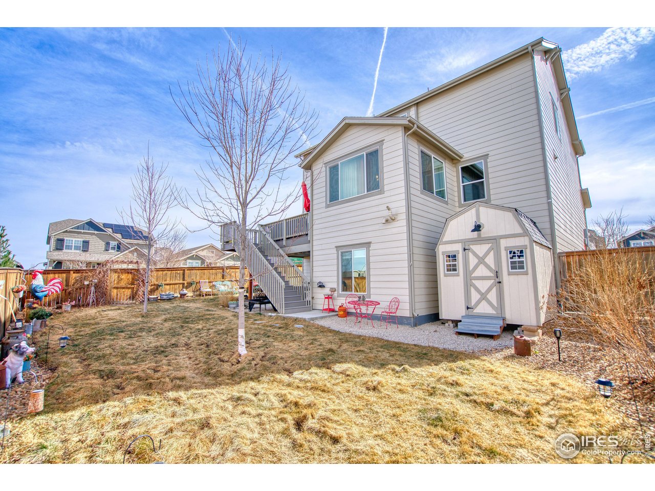 810 Ranchhand Drive Berthoud, CO 80513 - Photo 32 of 40 Huge backyard for play or pets. Storage shed is included.