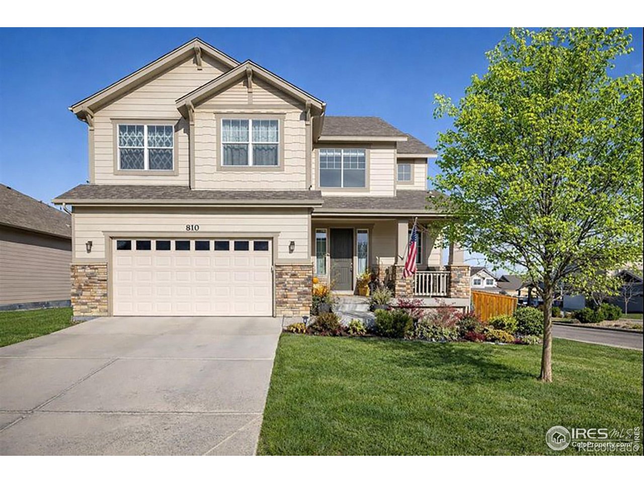 810 Ranchhand Drive Berthoud, CO 80513 - Photo 35 of 40 Great shot of the home in springtime.