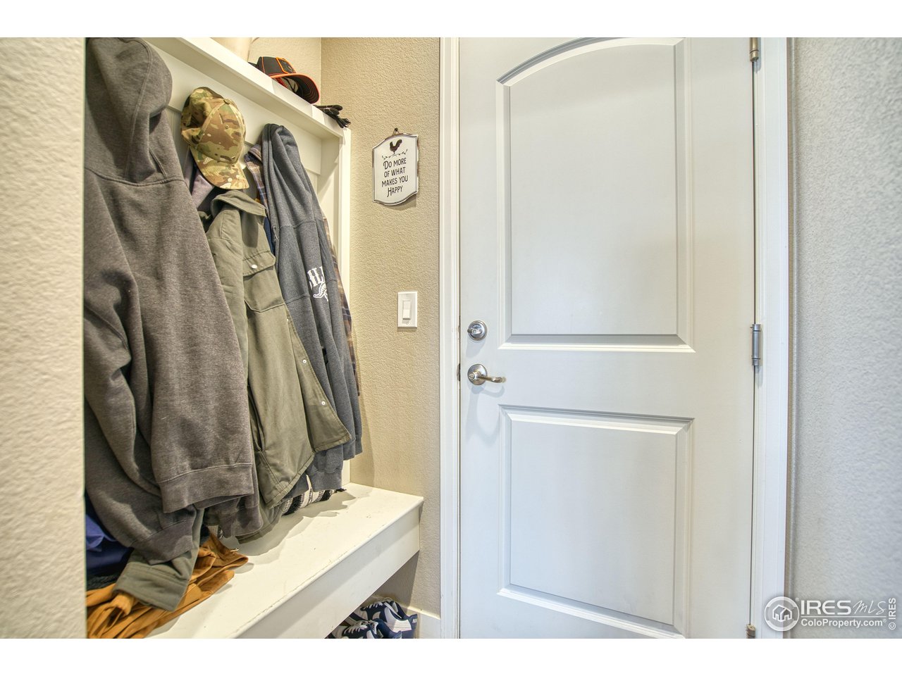 810 Ranchhand Drive Berthoud, CO 80513 - Photo 5 of 40 Mud room offers built-in hooks, bench & storage for shoes.