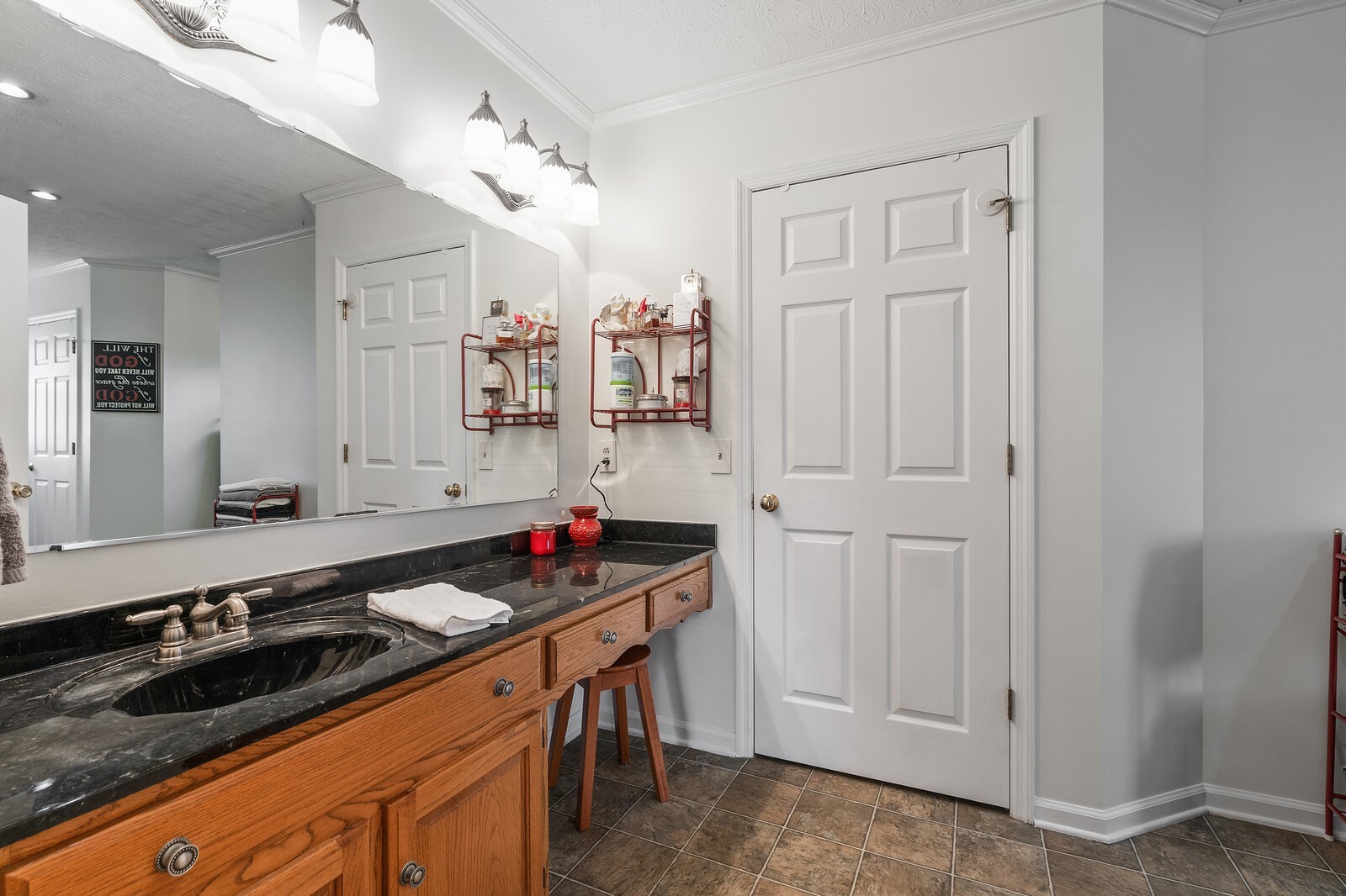 387 Ranch Road Portland, TN 37148 - Photo 25 of 39 a kitchen with stainless steel appliances granite countertop a stove and a refrigerator
