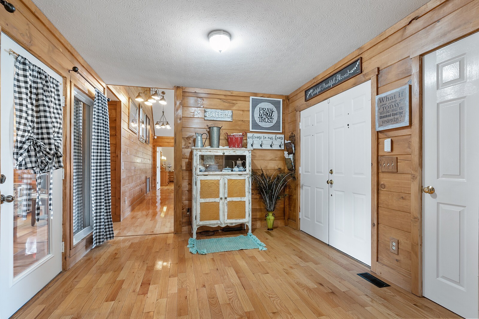 387 Ranch Road Portland, TN 37148 - Photo 5 of 39 a view of empty room with wooden floor