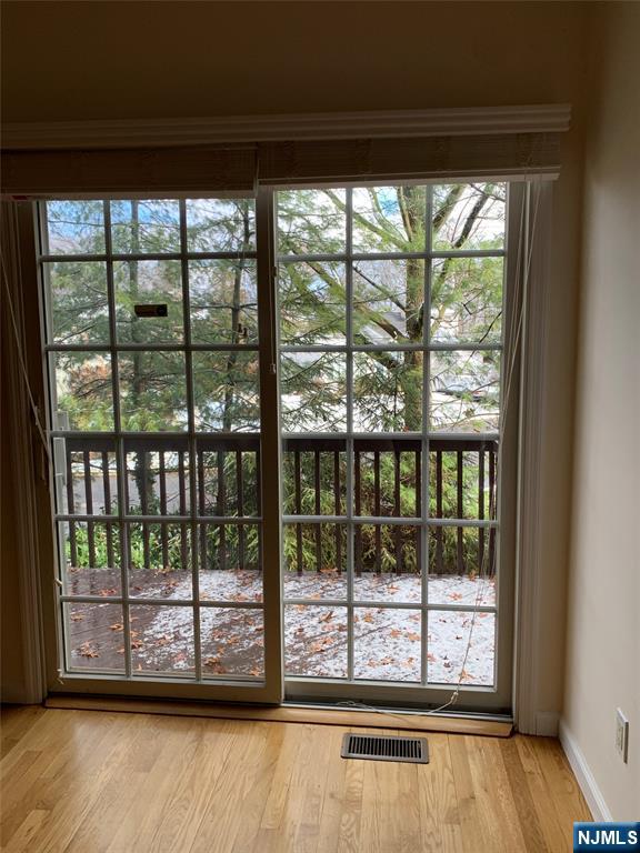 166 Stonegate Trail Cresskill, NJ 07626 - Photo 11 of 28 a view of a room that has a large window