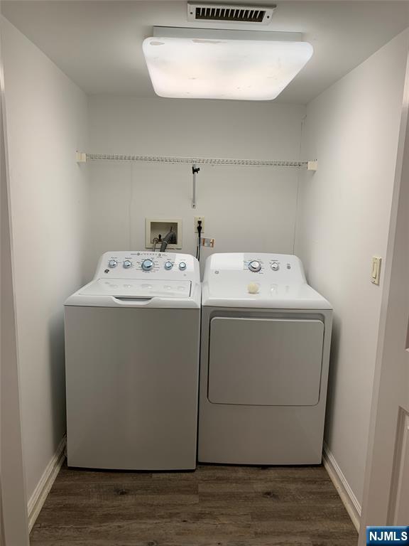 166 Stonegate Trail Cresskill, NJ 07626 - Photo 27 of 28 a utility room with dryer and washer