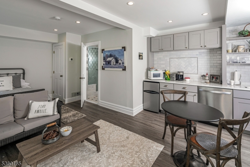 760 Rosemont Ringoes Road Stockton, NJ 08559 - Photo 31 of 49 a living room with furniture and kitchen view