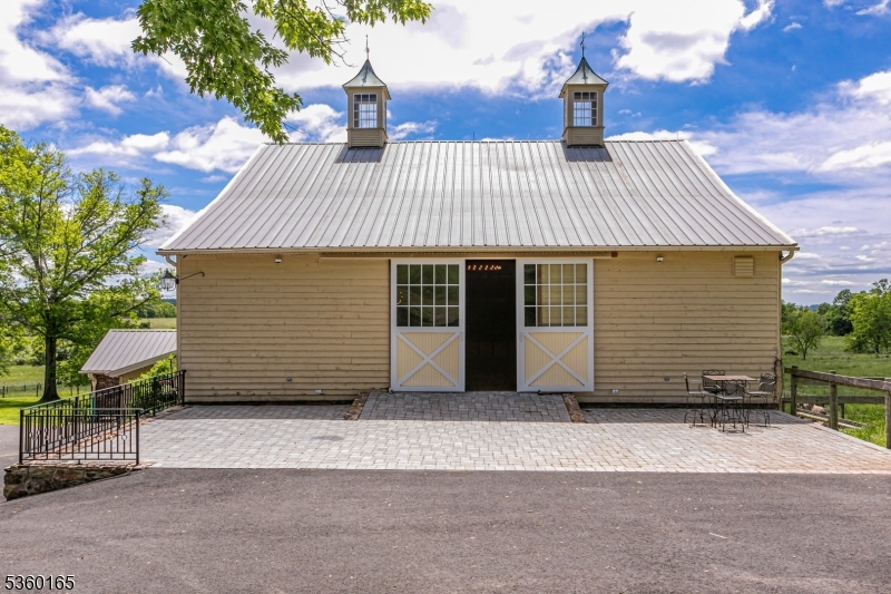 760 Rosemont Ringoes Road Stockton, NJ 08559 - Photo 44 of 49 a front view of a house with a garage