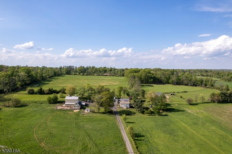 760 Rosemont Ringoes Road Stockton, NJ 08559 - Photo 5 of 49 a view of a lake with houses in the back
