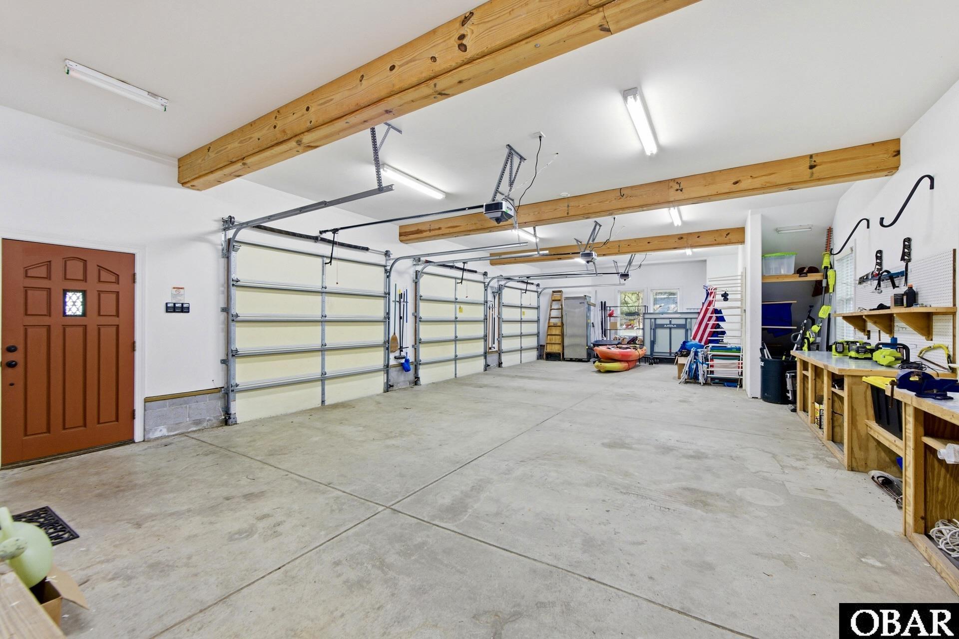 1044 Martins Point Road, Unit 11 Kitty Hawk, NC 27949 - Photo 45 of 50 3 Car Garage and Work Bench