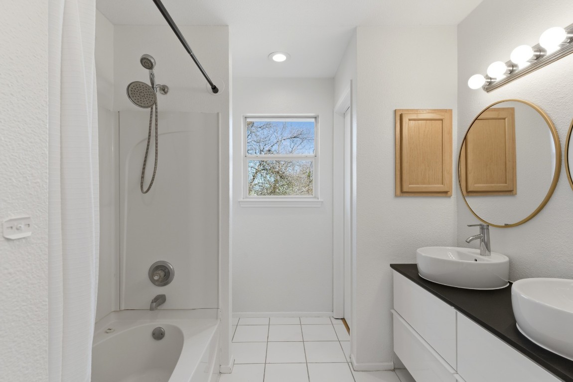 93 County Road 130 Georgetown, TX 78626 - Photo 18 of 27 a bathroom with a sink toilet and shower