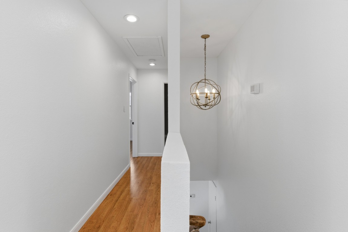 93 County Road 130 Georgetown, TX 78626 - Photo 21 of 27 a view of a hallway with wooden floor and a window
