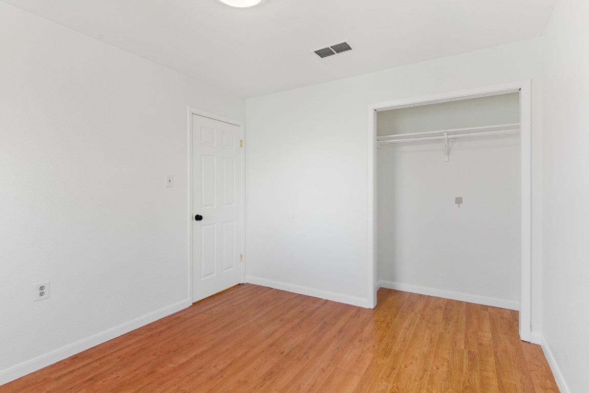 93 County Road 130 Georgetown, TX 78626 - Photo 24 of 27 a view of empty room with wooden floor