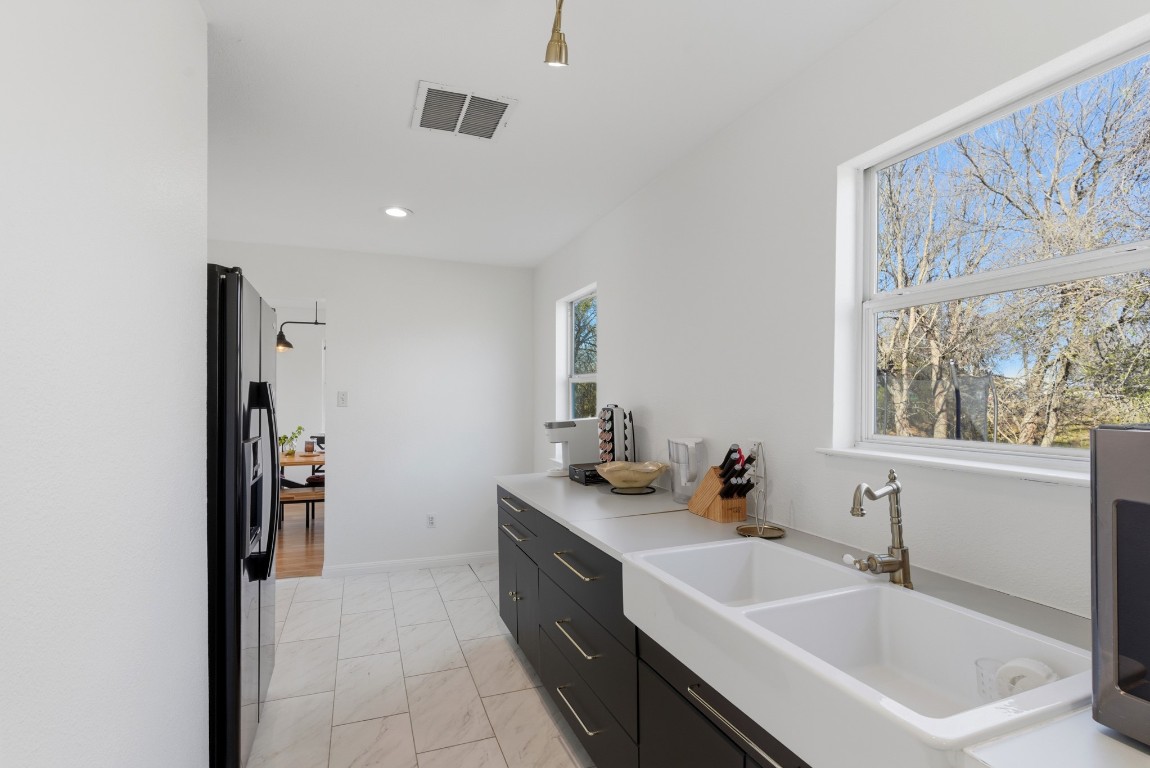 93 County Road 130 Georgetown, TX 78626 - Photo 6 of 27 a bathroom with a sink and a mirror