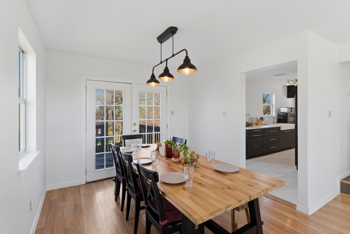 93 County Road 130 Georgetown, TX 78626 - Photo 8 of 27 a view of a dining room with furniture window and wooden floor