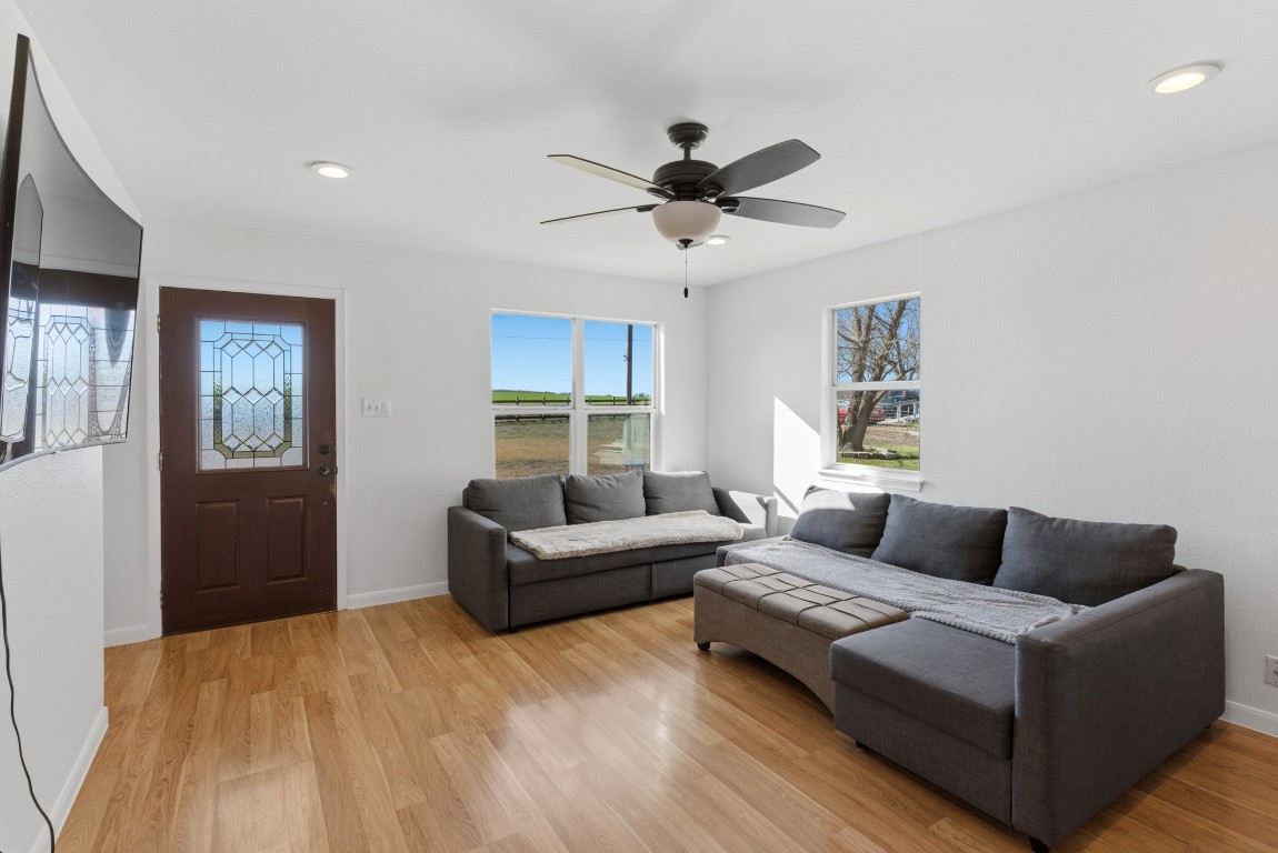 93 County Road 130 Georgetown, TX 78626 - Photo 10 of 27 a living room with furniture and a window