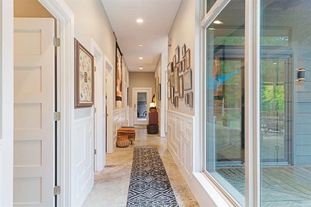 323 County Road Powderly, TX 75473 - Photo 13 of 36 a bathroom with a glass door shower