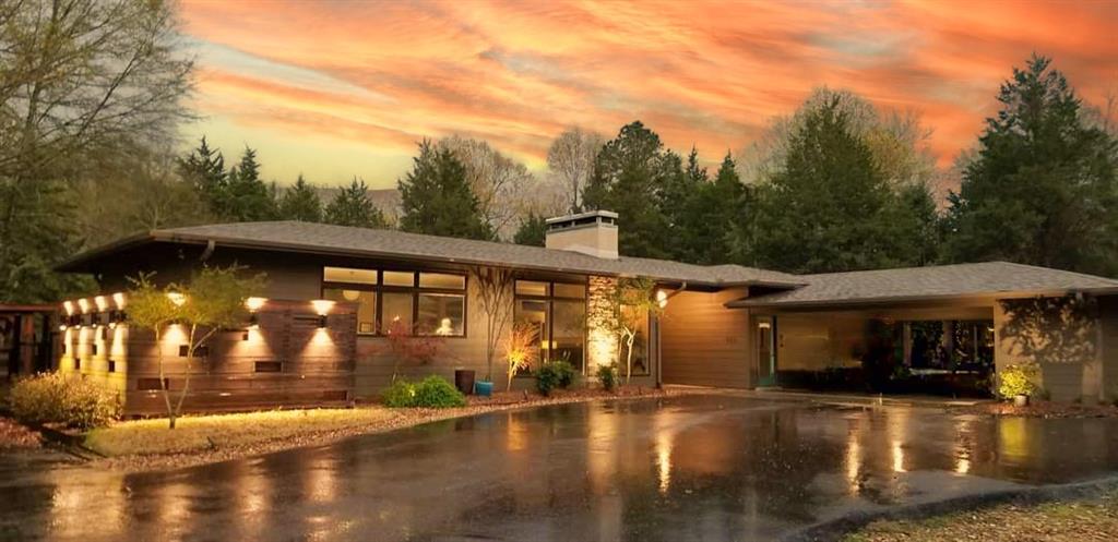 323 County Road Powderly, TX 75473 - Photo 2 of 36 a front view of a house with yard