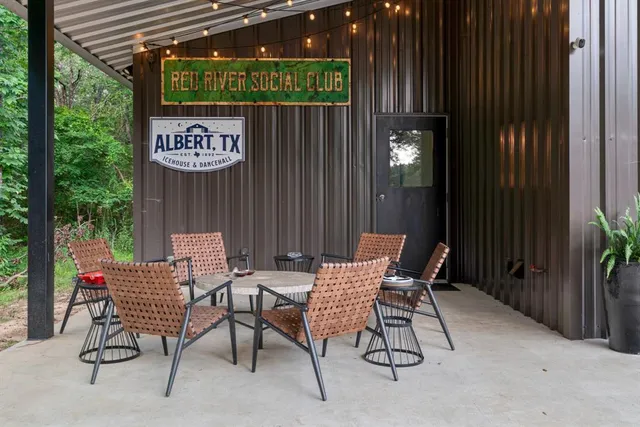 a chairs and table in a patio