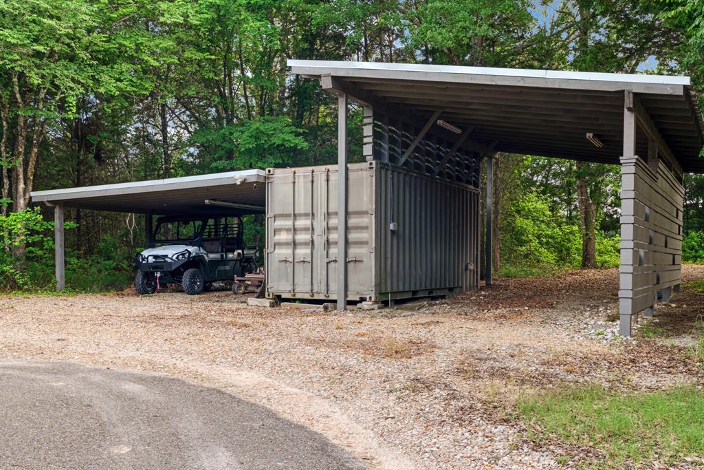 323 County Road Powderly, TX 75473 - Photo 34 of 36 a view of outdoor space and deck